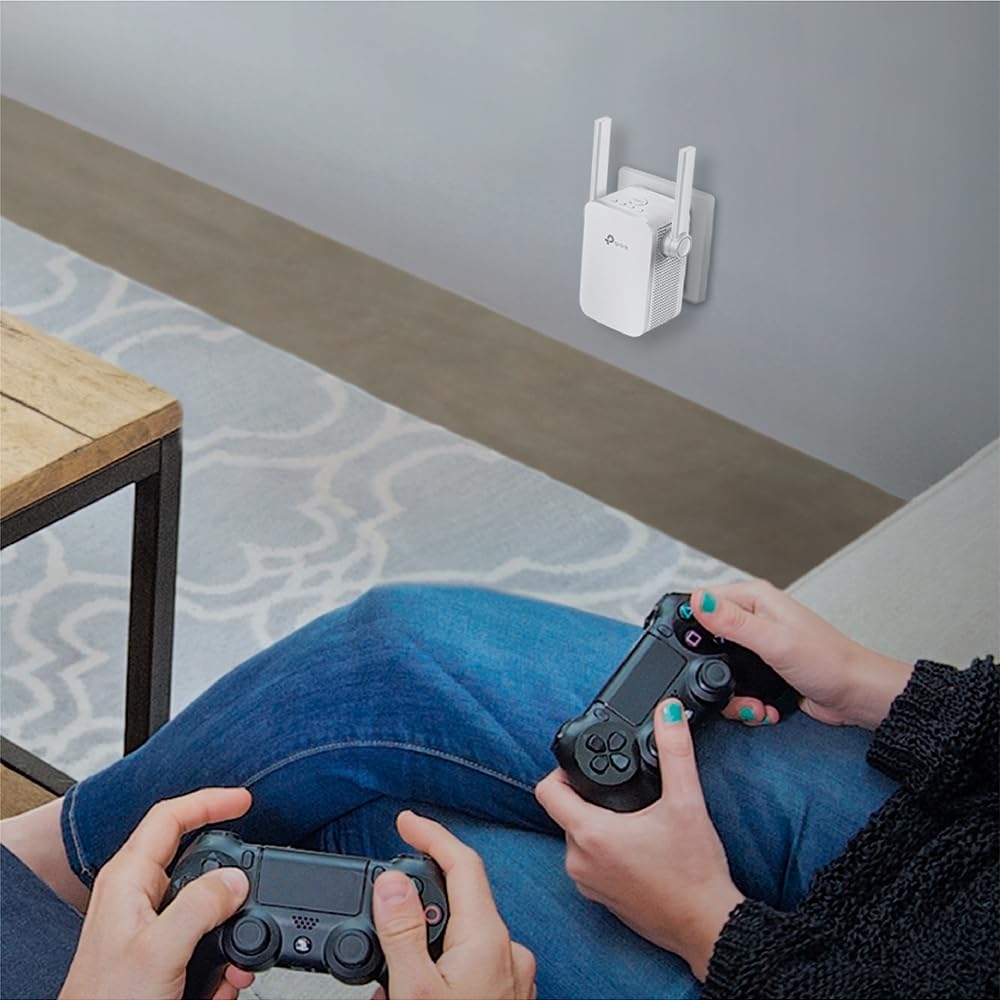 RE205 AC750 Universal Wireless Dual Band Range Extender, Broadband/Wi-Fi Extender, WiFi Booster/Hotspot with Ethernet Port, 2 External Antennas, Plug and Play, Smart Signal Indicator, 750Mbps